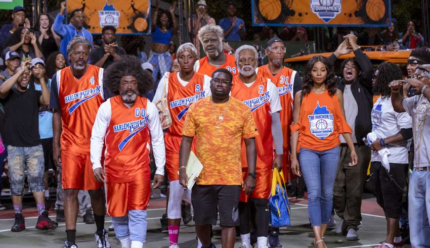 (L to R) Chris Webber, Nate Robinson, Lisa Leslie, Shaquille O’Neal as, Lil Rel Howery, Kyrie Irving, Reggie Miller, and Erica Ash star in Lionsgate Films' UNCLE DREW